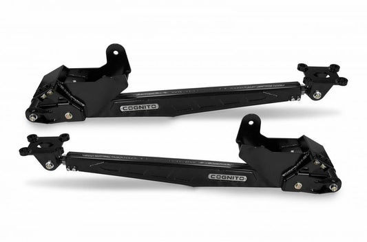 Two black Cognito Motorsports SM Series LDG Traction Bar Kits for 11-19 Silverado/Sierra 2500/3500 2WD/4WD with a 0-5.5 inch rear lift height, designed for vehicular use. They feature a sleek, angular design and are positioned side by side against a white background. Each bar has the Cognito logo printed on it, highlighting their heavy-duty construction.
