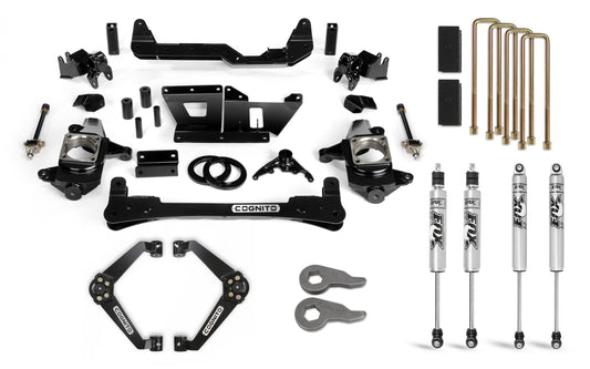 Discover the Cognito 6-Inch Standard Lift Kit with Fox PS 2.0 IFP Shocks for 01-10 Silverado/Sierra 2500/3500 2WD/4WD, a sleek collection of black and silver automotive suspension components. This comprehensive kit includes control arms, shocks, torsion bar keys, and hardware. The non-torsion bar drop front lift kit parts are neatly arranged on a white background and prominently labeled with the brands "Cognito Motorsports" and "Fox.