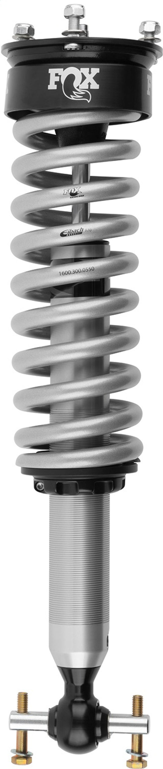 The Fox 19+ GM 1500 2.0 Performance Series 4.9in. IFP Coilover Shock / 0-2in Lift showcases a striking design with its silver and black color scheme, prominent coil spring, mounted shock absorber, and adjustable top mount. Built with robust aluminum bodies and advanced performance shock valving, it is engineered for exceptional off-road capabilities. The FOX logo is prominently displayed at the top of this high-performance suspension system.