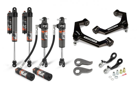 The Cognito 3-Inch Elite Leveling Kit with Fox Elite 2.5 Reservoir Shocks for 11-19 Silverado/Sierra 2500/3500 2WD/4WD is visually presented, featuring four premium Fox shocks with external reservoirs, two high-quality Cognito upper control arms, torsion keys, and an assortment of essential hardware including bolts and nuts. This comprehensive kit by Cognito Motorsports is the perfect solution for leveling your Silverado or Sierra.
