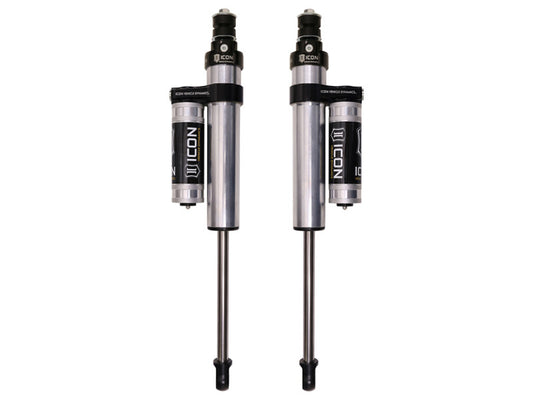 The ICON 01-10 GM HD 0-2.5in Front 2.5 Series Shocks VS PB - Pair delivers exceptional off-road performance with its remote reservoirs. These shocks feature a sleek silver and black design, including cylindrical reservoirs attached at the top, making them ideal for adventure enthusiasts seeking superior ICON Vehicle Specific shocks.