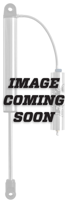 Greyed-out image with the text "IMAGE COMING SOON" overlaid on a suspension shock absorber showcasing the performance-driven FOX 2011+ GMC Sierra 2500/3500 HD 4-6in Lift Rear 2.5 Performance Series Smooth Body IFP HTO Shock.