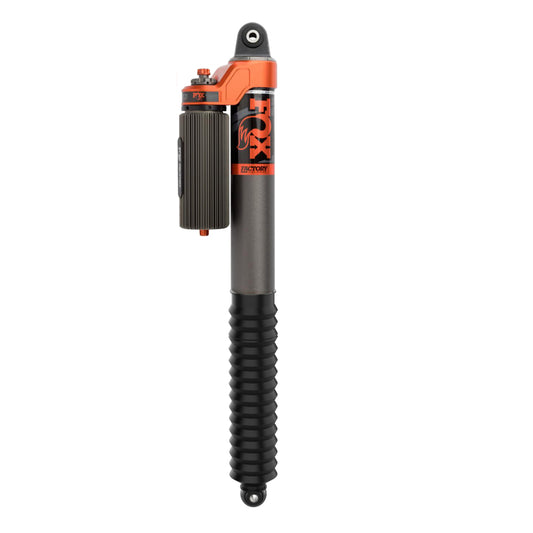 A close-up of the FOX 2021+ Ford F-150 0-1in Lift Rear Factory Race Series 3.0 Internal Bypass Piggyback Shock displaying its orange and black design, cylindrical body, coiled bottom, and reservoir. The FOX logo in orange adorns the top—ideal for boosting your Ford F-150's performance.