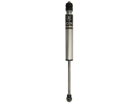 The image depicts the ICON 01-10 GM HD 0-2in Front 2.0 Series Aluminum Shocks VS IR, showcasing a silver body with a black top and the "ICON" branding on the label. The rod is fully extended, highlighting its rebuildable design for improved off-road performance in vehicle suspensions, all set against a plain white background.