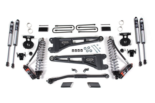 Image showcasing a BDS 3 Inch Lift Kit with Radius Arm, including FOX 2.5 Performance Elite Coil-Over Conversion components for the Ford F250/F350 Super Duty (20-22) Diesel 4WD. This kit includes coil springs, control arms, brackets, bolts, and various small parts arranged neatly on a white background. The components are new and primarily metallic in color.