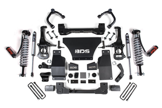 The BDS 2.5 Inch Lift Kit for Chevy Trail Boss or GMC AT4 1500 (2019-2022) 4WD, Gas model includes comprehensive suspension components like FOX 2.5 coil-over shocks, coil springs, brackets, and various hardware, all arranged on a white background. Ideal for boosting your vehicle's performance with dependable parts labeled under the "BDS" brand.