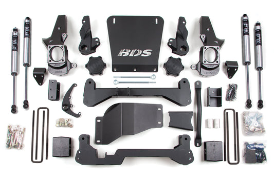 A diverse array of BDS suspension components, including shock absorbers, brackets, bolts, and various metal parts for a BDS 7-inch lift kit, are laid out on a white surface. The central piece proudly displays the "BDS" logo. Ideal for upgrading your Chevy Silverado or GMC Sierra 2500HD/3500 (01-10) 4WD.