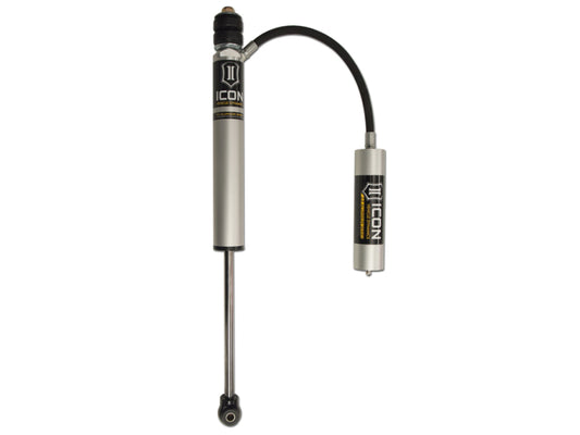 Close-up of a silver and black ICON 01-10 GM HD 6-8in Front 2.0 Series Aluminum Shock with a connected external reservoir, designed for off-road performance vehicles. The ICON branding is prominently visible on both the shock body and reservoir.