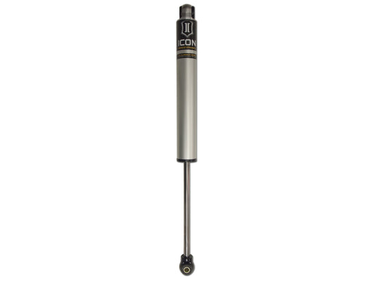 The ICON 01-16 GM HD 5-8in Rear 2.0 Series Aluminum Shocks VS IR from ICON features a silver body, black top, and a sleek black and gold label. Designed with a long, slim rod extending from the base, this shock absorber is engineered for superior off-road performance in vehicle suspension systems.