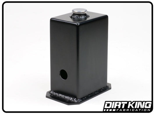The 14-18 GM 1500 Wiper Fluid Tank by DIRT KING is a black metal box that looks like a wiper fluid tank. It features a rounded cap on top and a hole on the side, all mounted on a rectangular aluminum base with visible welding. The company logo "Dirt King Fabrication" is prominently displayed in the bottom right corner of the base against a white background.