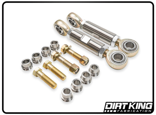 A collection of metal automotive parts is displayed on a white background, including two large cylindrical pieces with threaded ends and spherical bearings, several nuts, bolts, and bushings. The "Dirt King Fabrication" logo is featured in the bottom right corner. This image showcases the DIRT KING 19-24 GM 1500 Sway Bar Kit compatible with Chevy Silverado/GMC Sierra models.